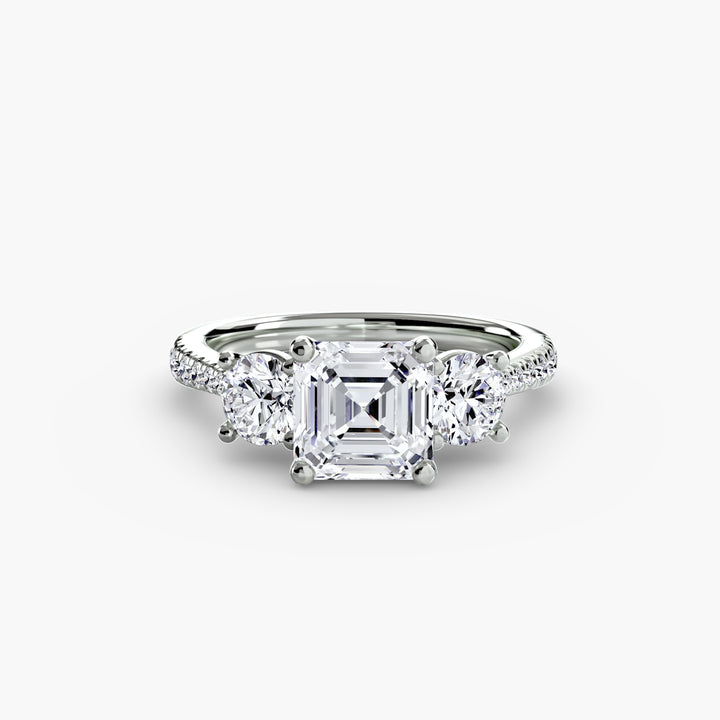 BROMONT IV Three Stone Diamond Engagement Ring with a Diamond Band