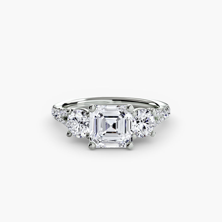 BROMONT III Three Stone Diamond Engagement Ring with a Diamond Band