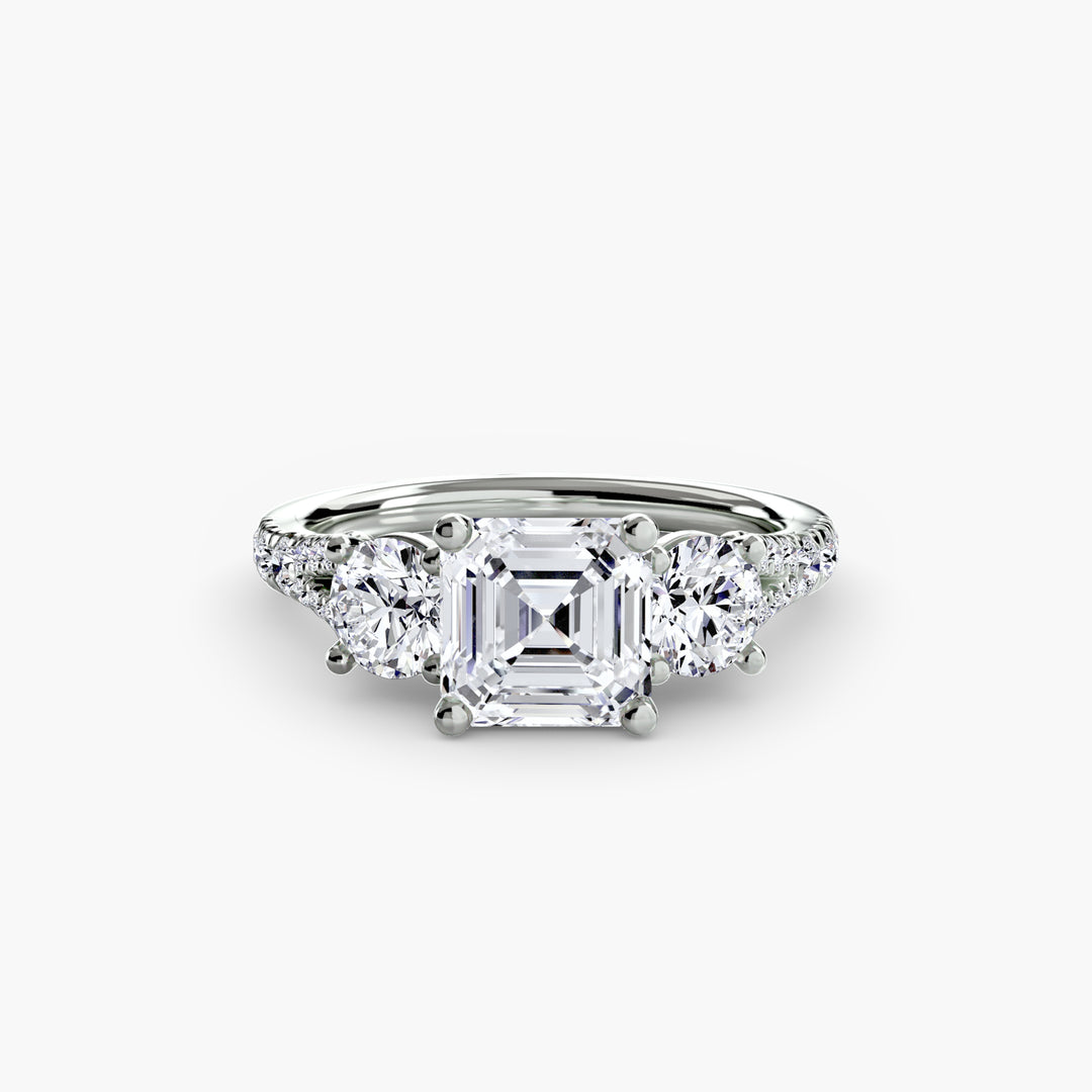 BROMONT III Three Stone Diamond Engagement Ring with a Diamond Band