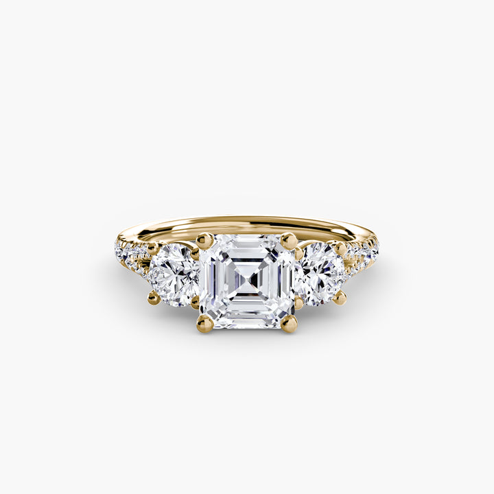 BROMONT III Three Stone Diamond Engagement Ring with a Diamond Band