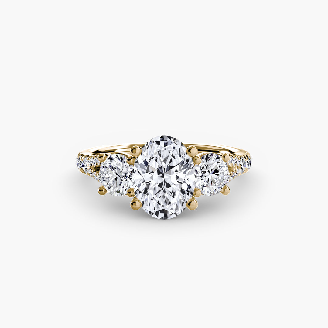 BROMONT III Three Stone Diamond Engagement Ring with a Diamond Band