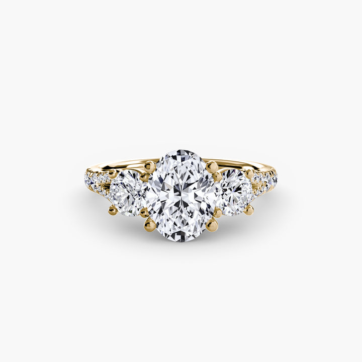 BROMONT III Three Stone Diamond Engagement Ring with a Diamond Band