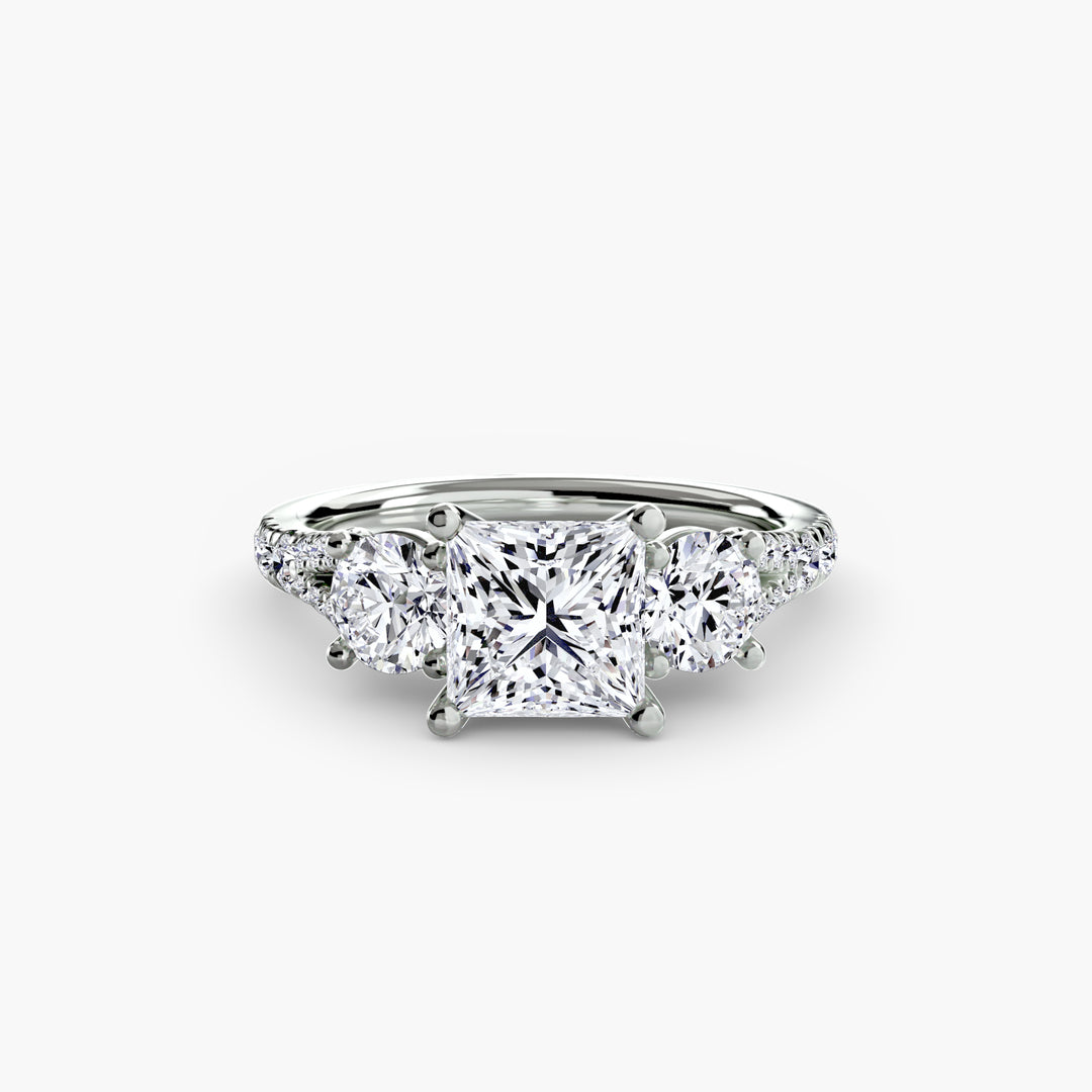 BROMONT III Three Stone Diamond Engagement Ring with a Diamond Band