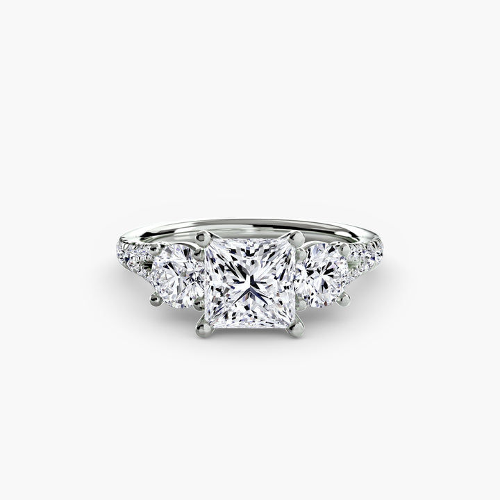 BROMONT III Three Stone Diamond Engagement Ring with a Diamond Band
