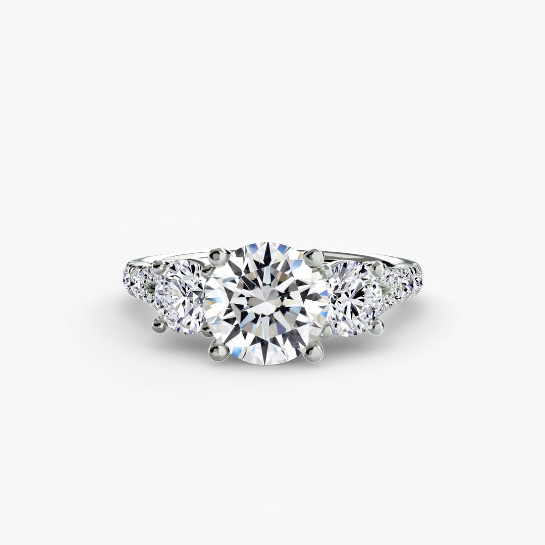 BROMONT III Three Stone Diamond Engagement Ring with a Diamond Band