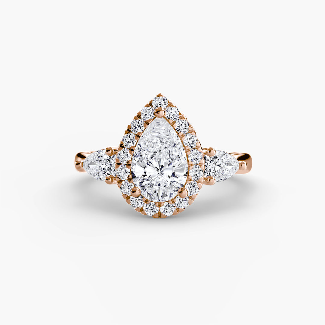 ORELL I Pear-cut Halo Diamond Engagement Ring with a Surprise Diamond
